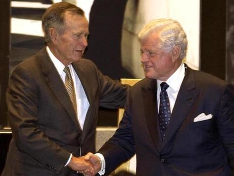 George H.W. Bush shook hands with Senator Edward M. Kennedy in 2003 during an event in College Station, Texas.
